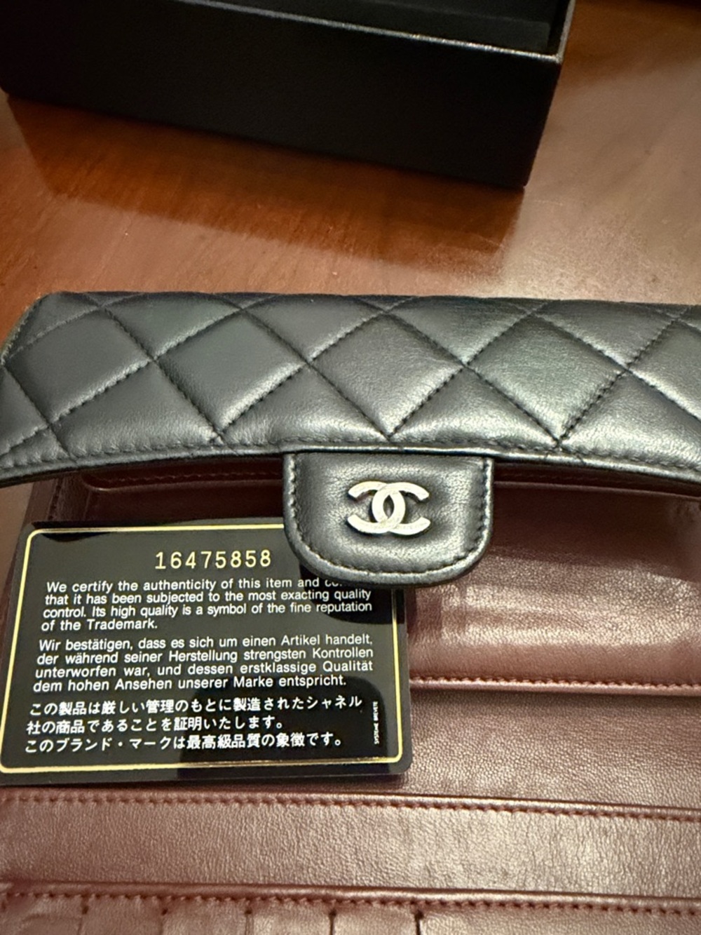 CHANEL Quilted Lambskin Wallet in Black with Silver CC - Picture 9 of 11